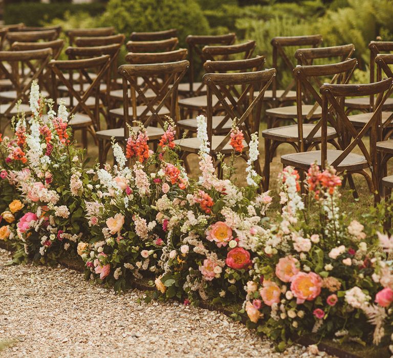 Pink and white wedding aisle flower decorations for outdoor botanical wedding at The Four Seasons wedding venue 