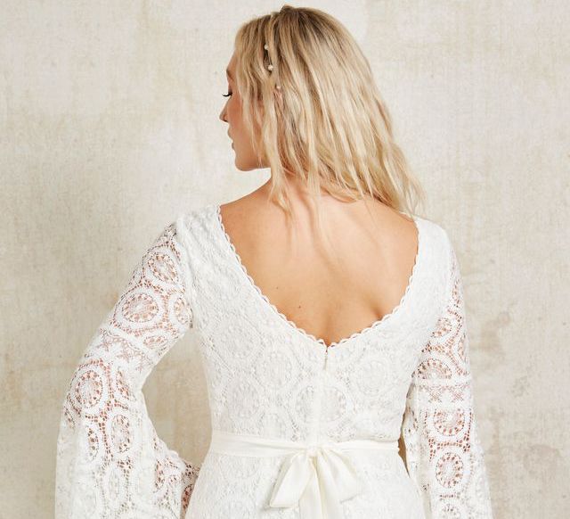 Sustainable wedding dress with bell sleeves and low back from Indiebride London in boho style