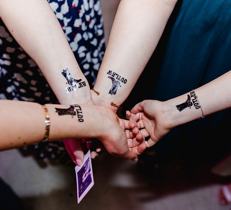 Temporary tattoo station wedding entertainment idea 