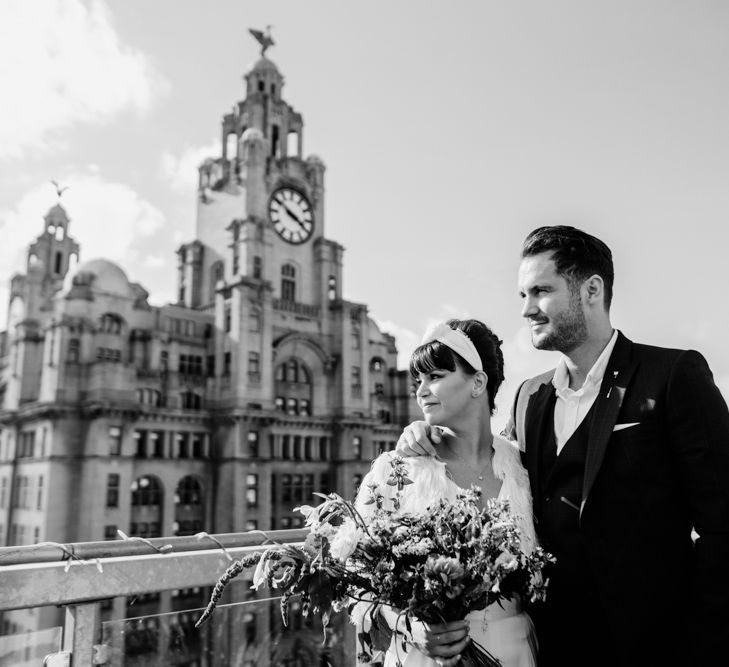 Bride and groom at rooftop bar for Liverpool wedding 