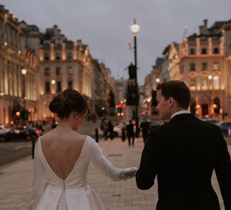 Bride and groom evening of their wedding day in London City 