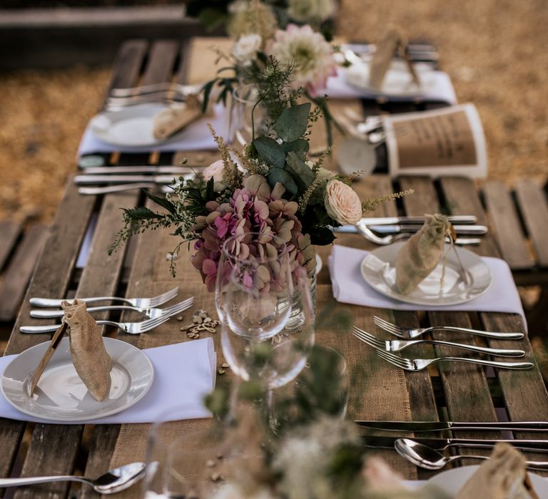 Rustic table decoration for outdoor wedding