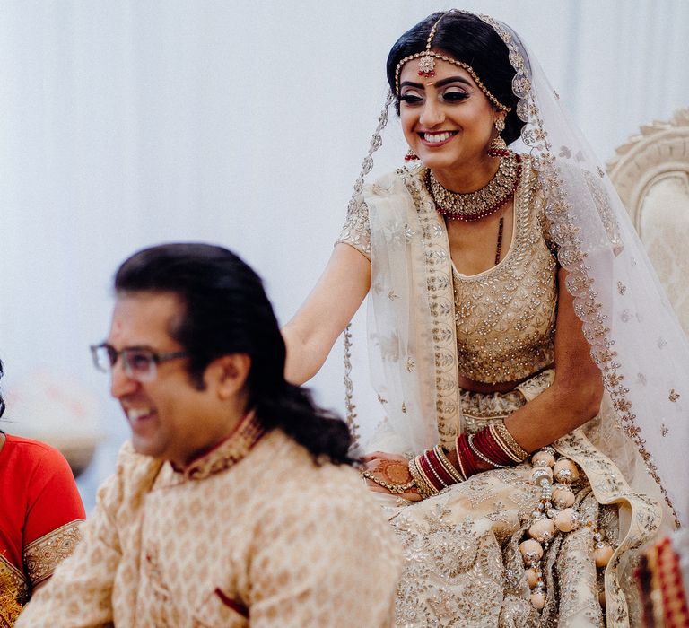 Wedding guests during traditional Hindu ceremony