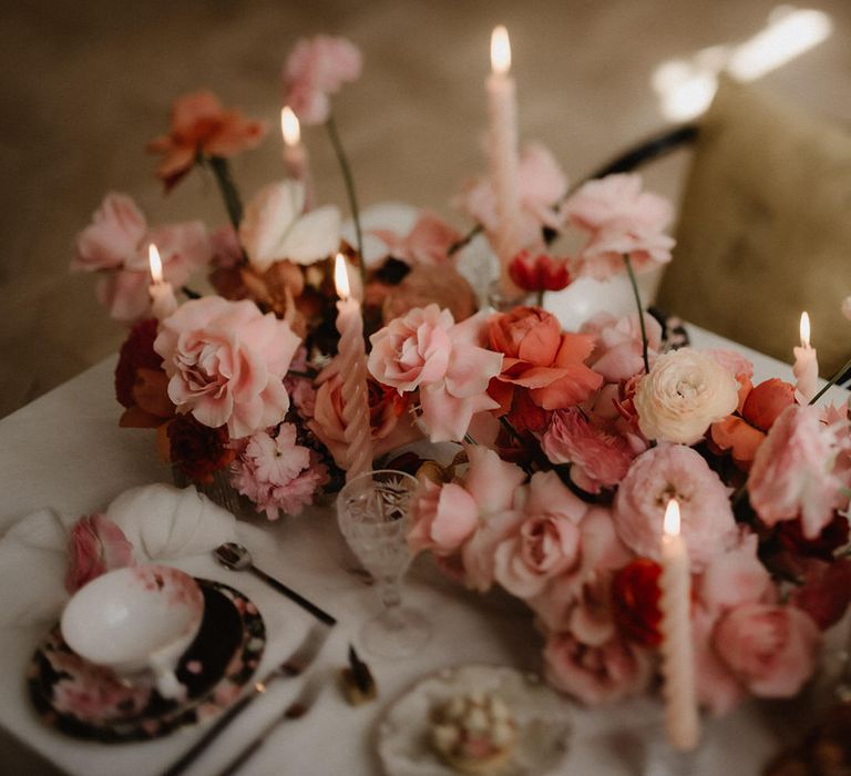 Pink and peach wedding flower centrepiece for luxe romantic wedding