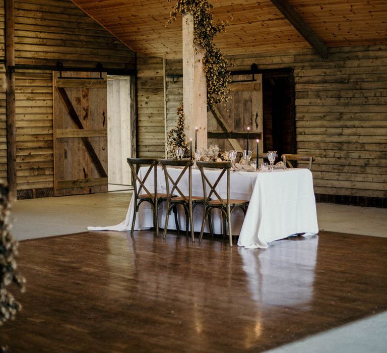 Rustic luxe wedding ideas at High Billinghurst Farm with neutral toned tablescape and decor