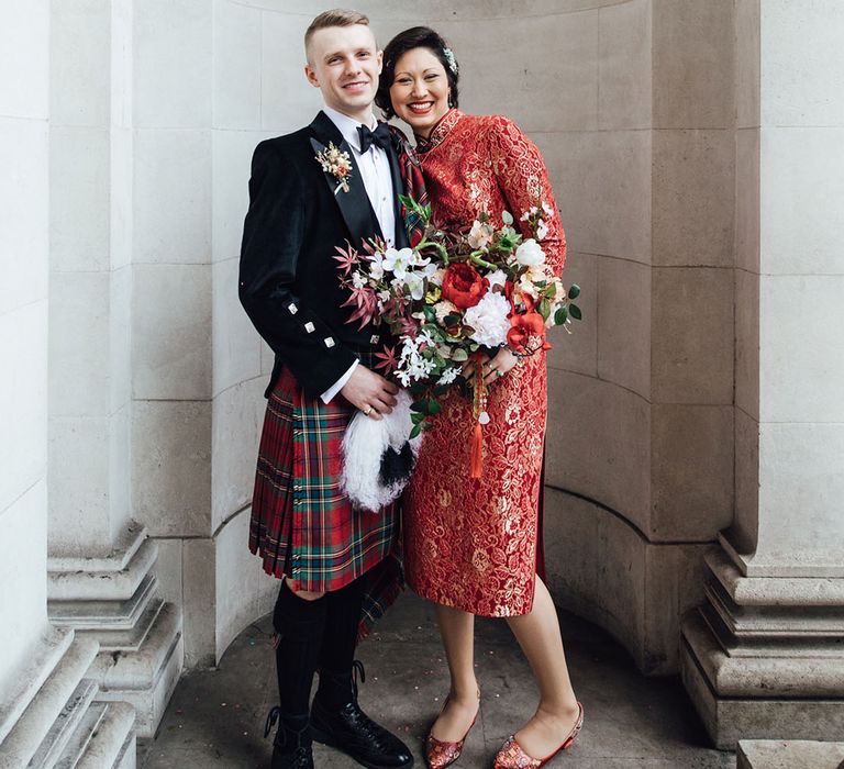 Large red and white floral bouquet for bride at intimate elopement