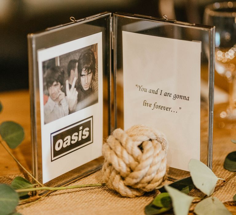 Framed Oasis picture with song quote for table names 