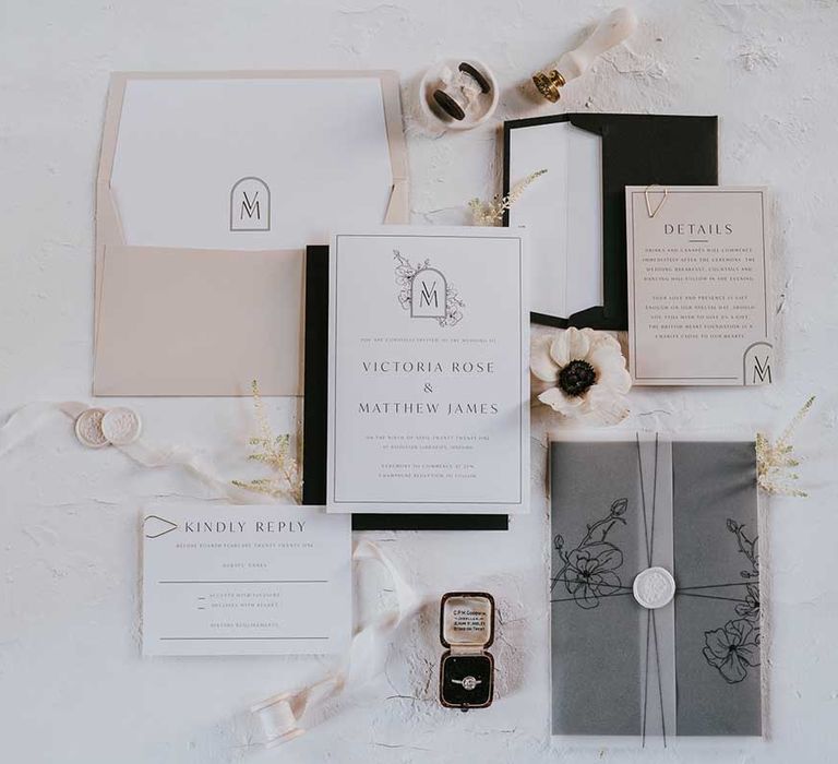 Monochrome wedding stationery suite with vellum and wax seal details