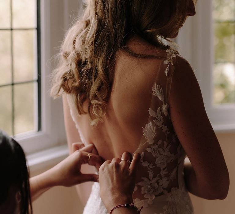 Lace detail low back Pronovias wedding dress