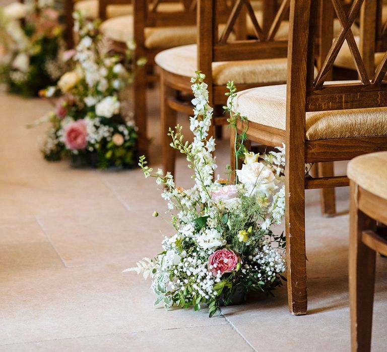 Aisle wedding ceremony flowers with pink and white stocks and roses 