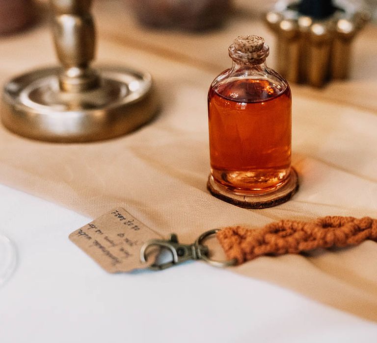 Small mason jar complete with cork stopper and hand woven keychain 