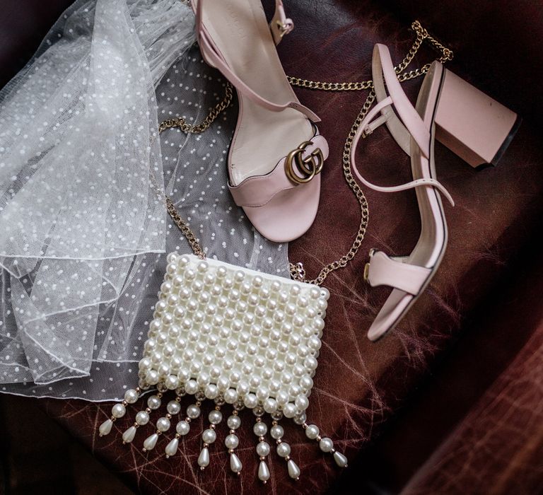 Pearl wedding handbag and pink Gucci wedding shoes bridal accessories 