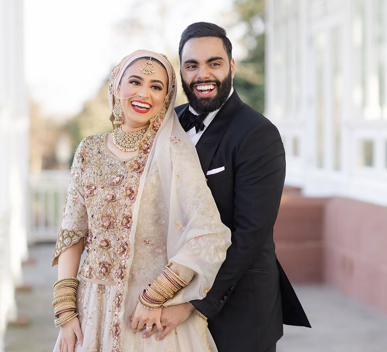 Bride & groom smile brightly after Walima & Nikkah ceremony at the Isla Gladstone Conservatory