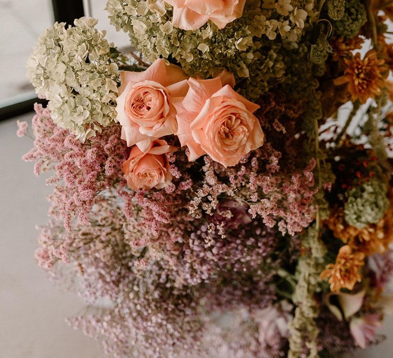 Pretty wedding flowers in muted neutral tones and pale pinks 