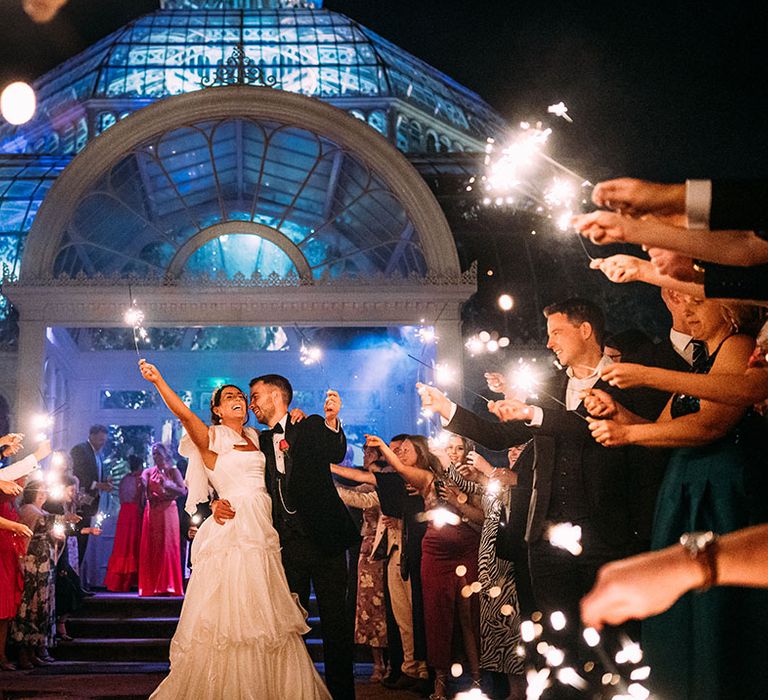 Fun sparkler send off for the couple at Sefton Park Palm House wedding 