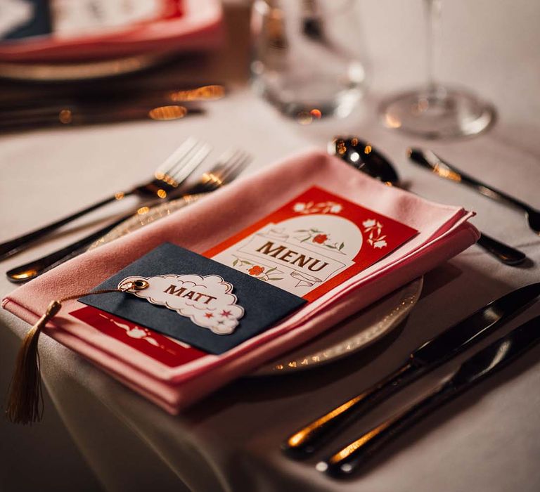 Fairground style place setting for carnival wedding with carousel 