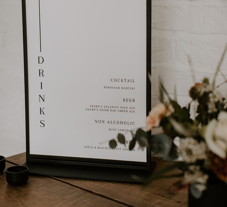 Black and white wedding drinks menu signage 