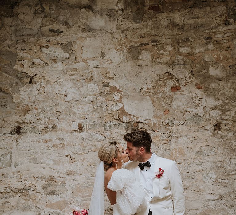 Middleton Lodge wedding with bride and groom posing together 