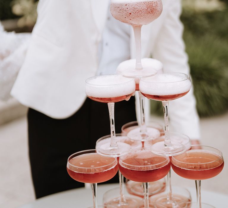 Pink champagne tower wedding decoration for timeless country house wedding 