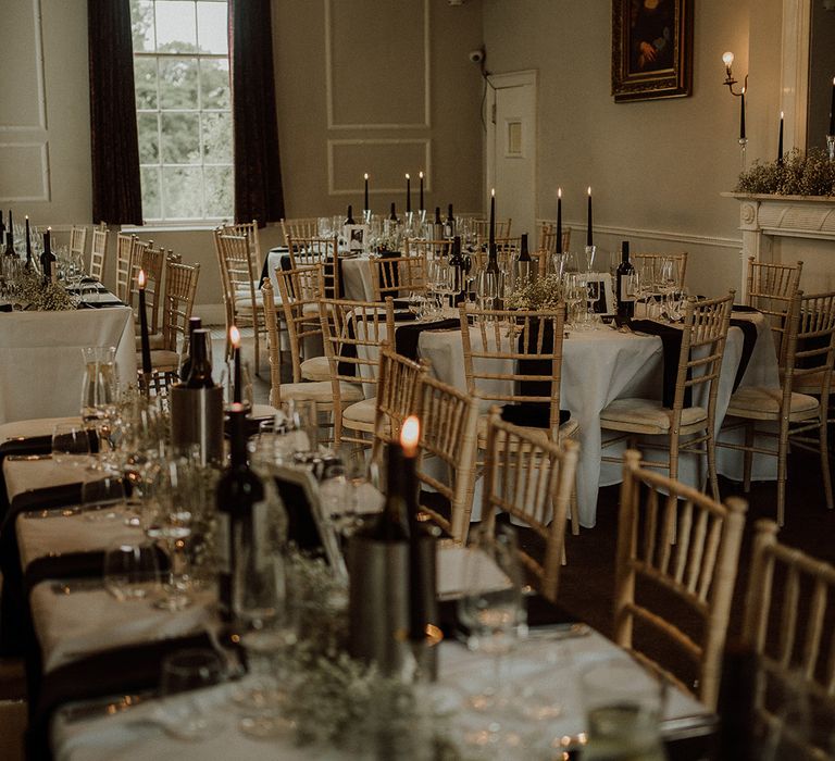 Wedding country house decorated with gold and black decorations for subtle gothic wedding theme 