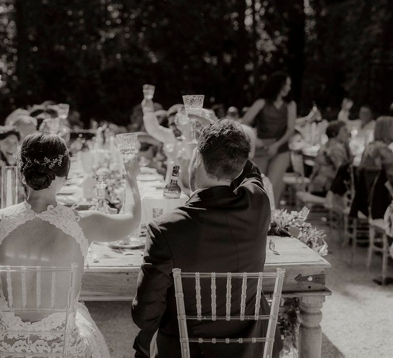 Sweetheart table for the bride and groom at their intimate dinner party wedding 