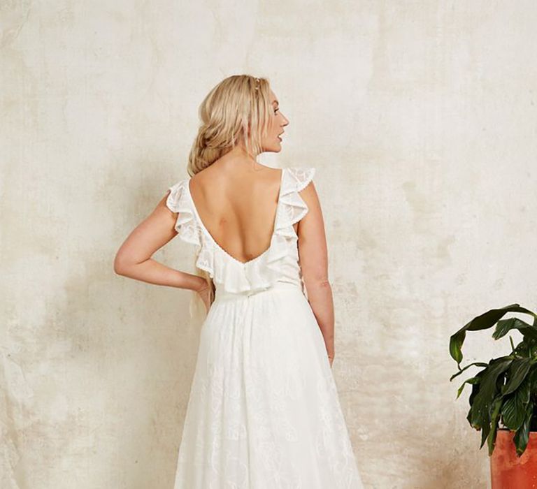 Sustainable wedding dress from Indiebride London with frills in boho style 