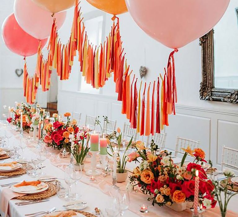 Pink and orange festival theme table decor by Sarah J Scott Photography