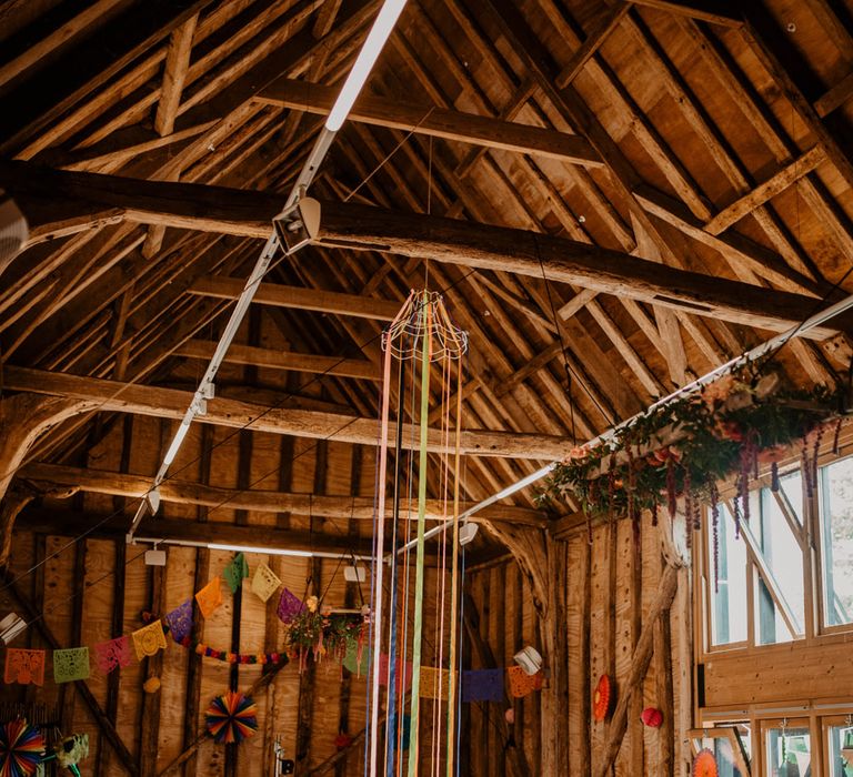 Barn wedding reception with stream chandelier 