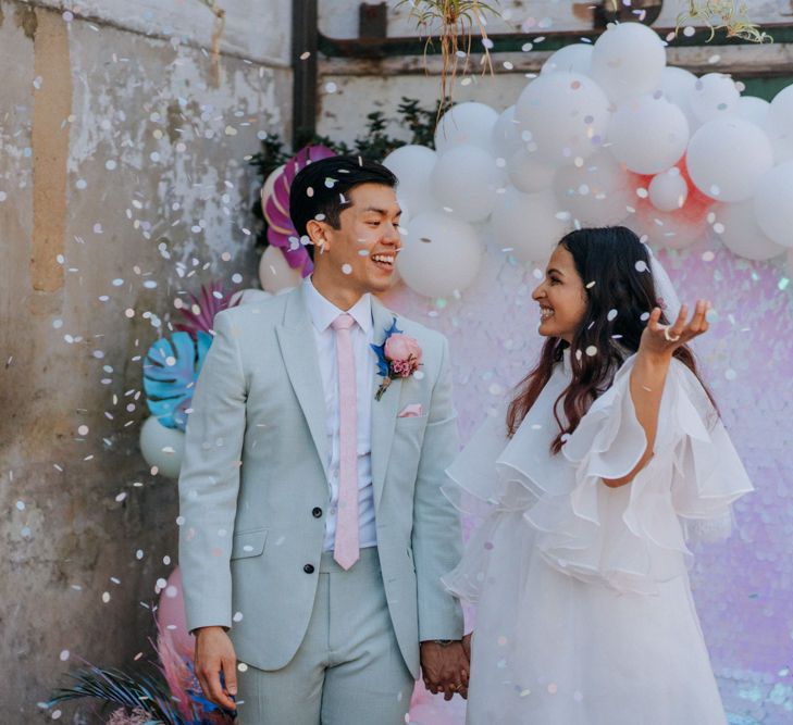 Holographic pastel festival wedding by Fresh Meat Workshop and Jump The Broom