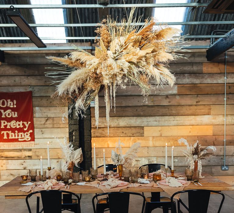 intimate industrial table setting with dried wedding flowers 