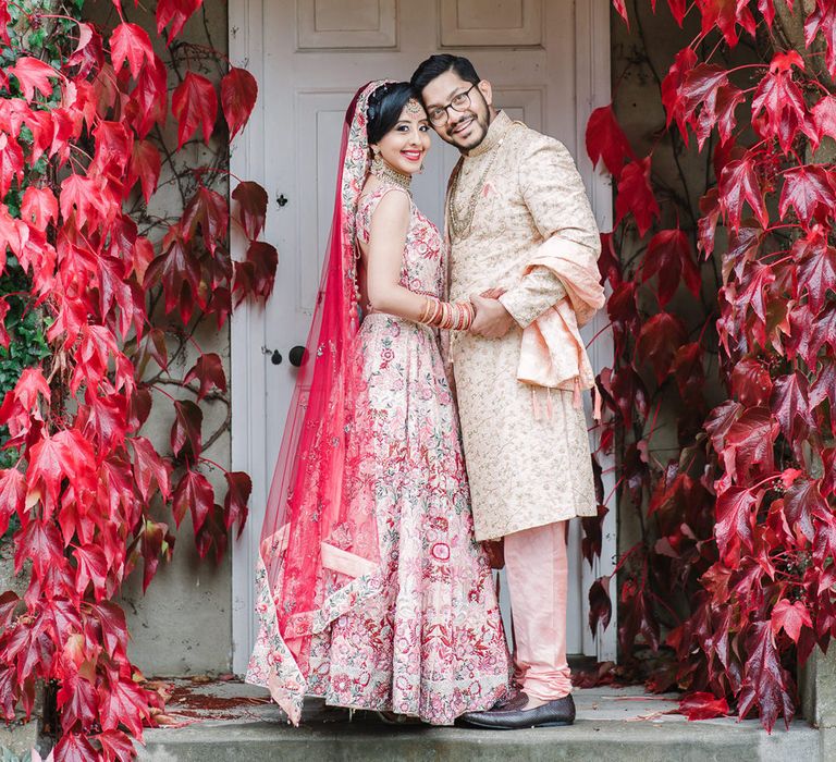 Autumn leaves surround the bride and groom portrait by Jessy Papasavva Photography