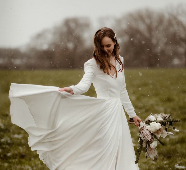 A simple and elegant Rita Colson wedding gown for a Methodist wedding