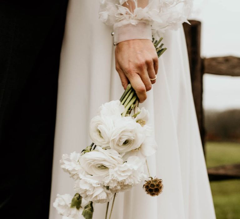 Simple white wedding bouquet for rustic luxe wedding idea