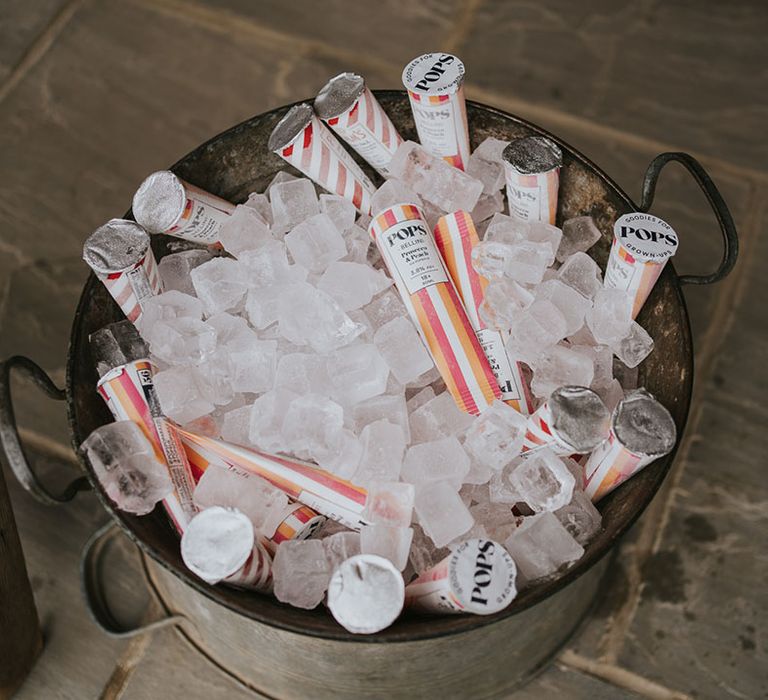 Vintage ice bucket with ice pops for wedding guests 