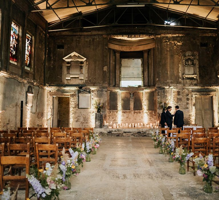 Groomsman at the stunning Asylum Chapel wedding venue with stained glass windows