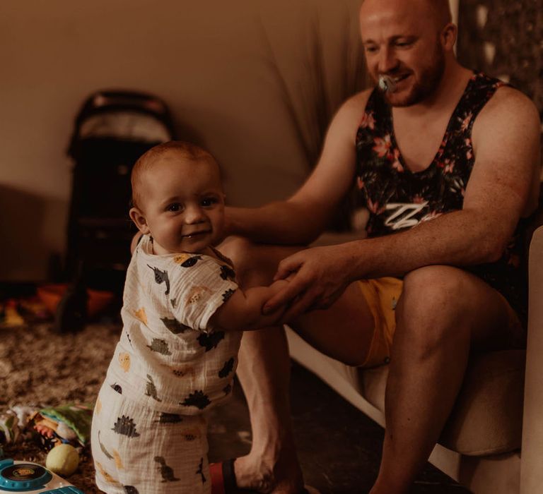 Groom and his son on the morning of wedding day 