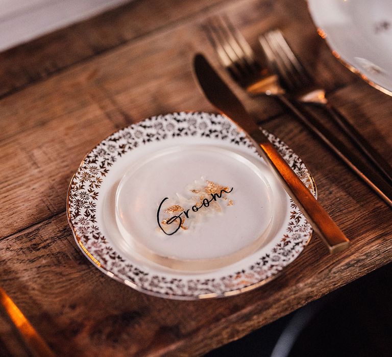 Acrylic wedding sign rounded place names with gold detail on the wedding table 