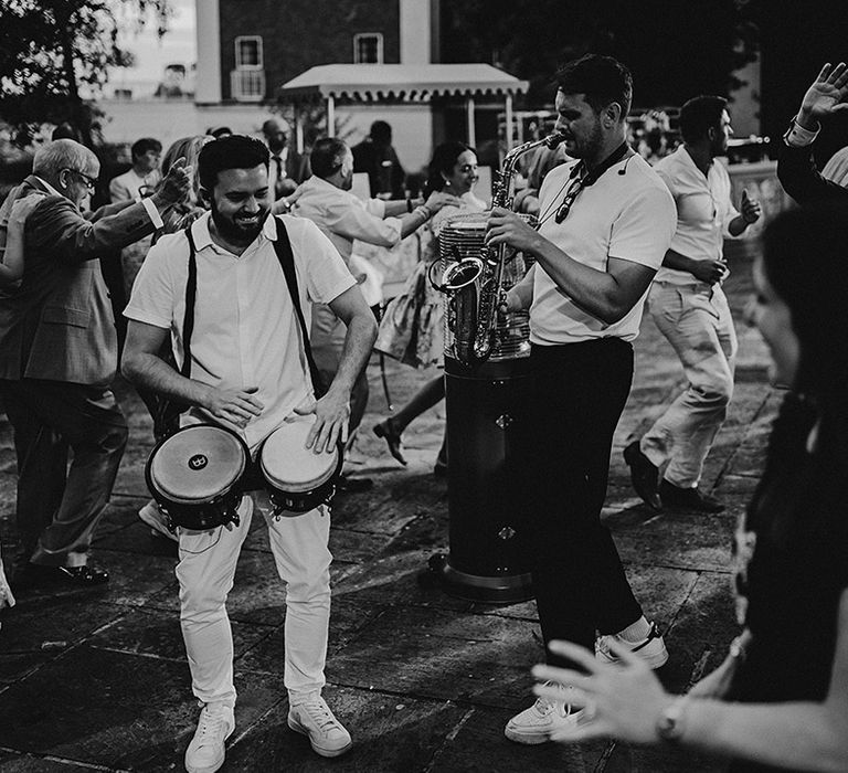 Outdoor wedding band playing for summer wedding 