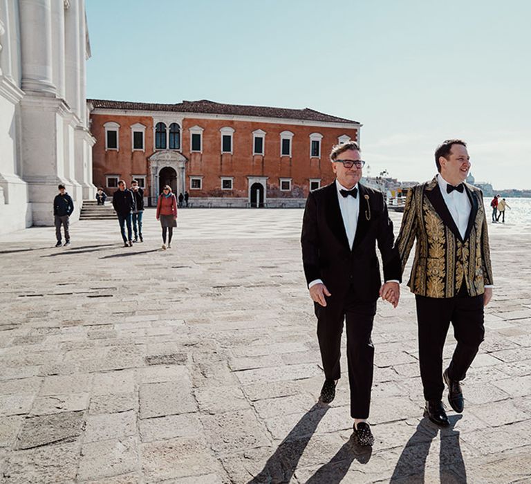 Two grooms at their destination wedding in Venice posing for their couple portraits 