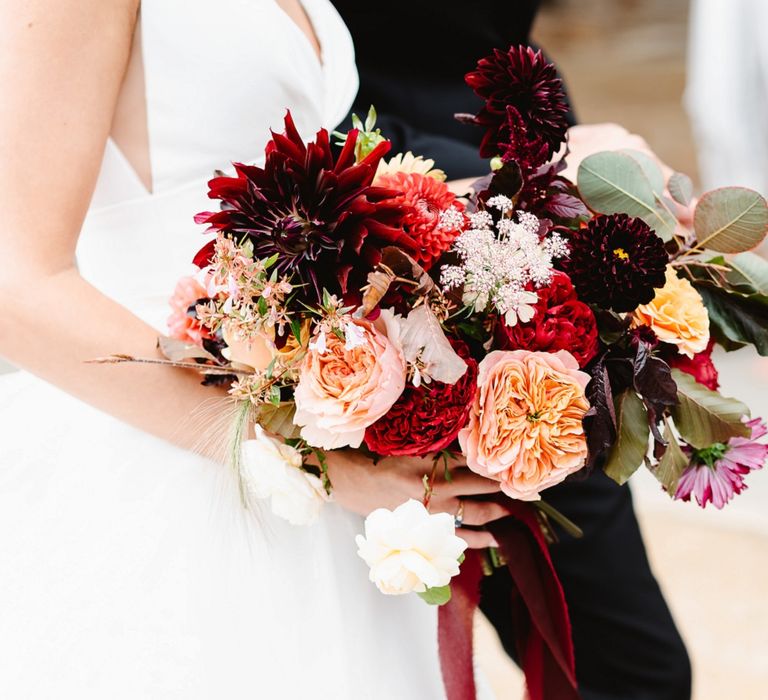 Deep red, burgundy and peach autumn wedding bouquet 