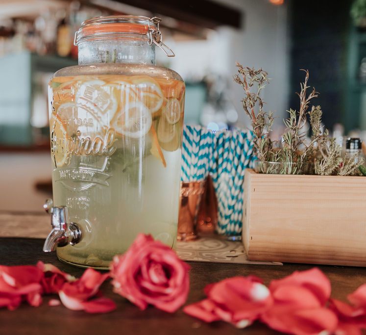 Drinks jar with pink petal decor