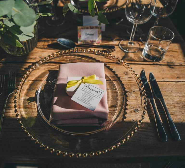 Glass plate with pink napkin wedding table settings