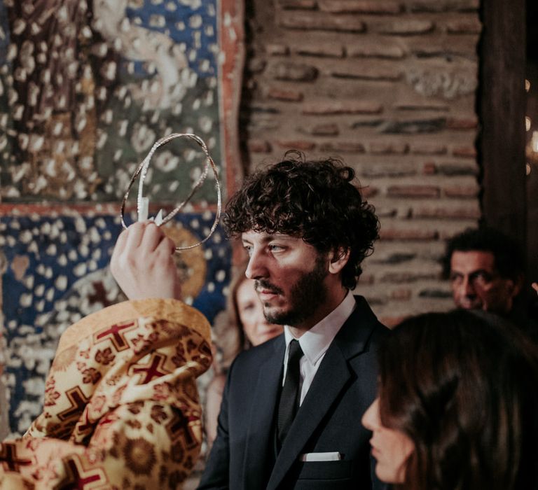 The bride and groom had a religious greek church wedding ceremony