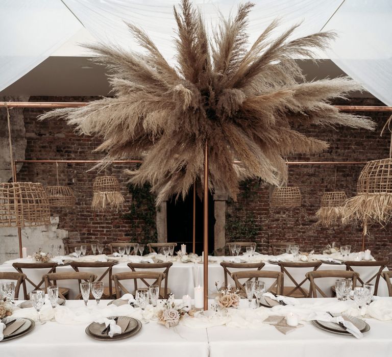 Pampas grass installation and wicker lampshade earthy wedding decor 