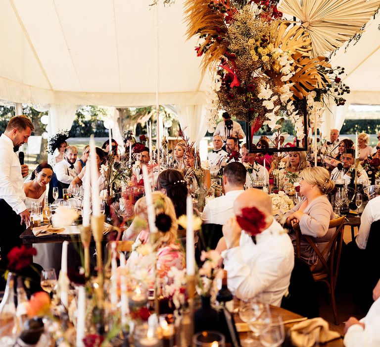 Dried flower installation in marquee wedding