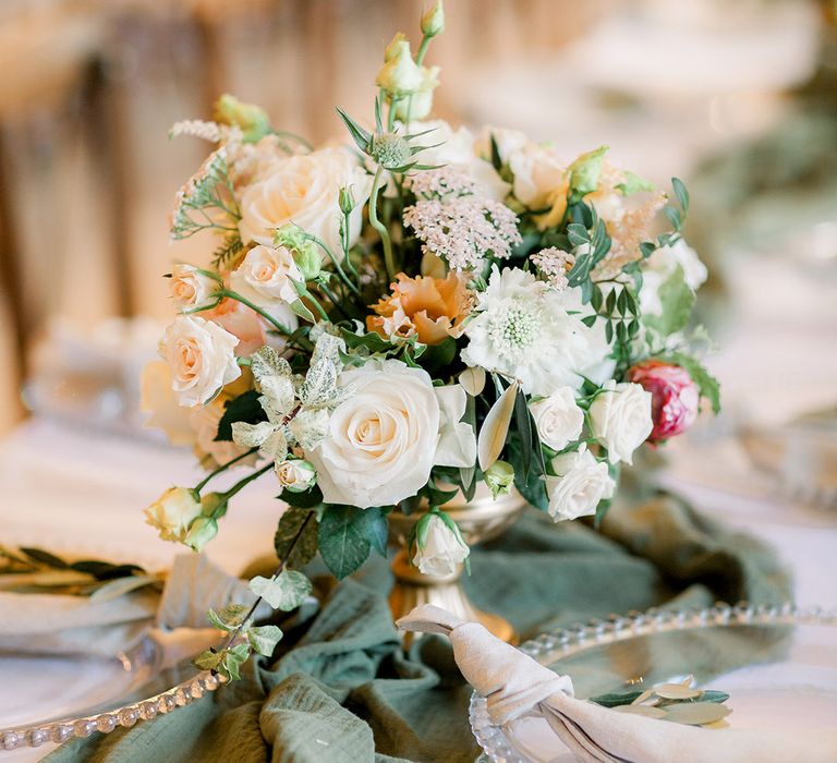 elegant wedding flower arrangement with spray roses and foliage at Italian themed wedding 