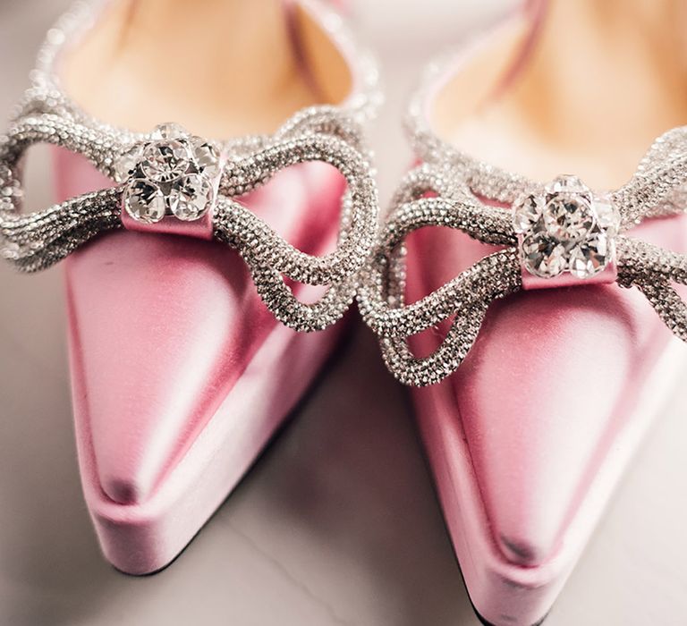 The bride's sparkly pink bow platform wedding shoes 