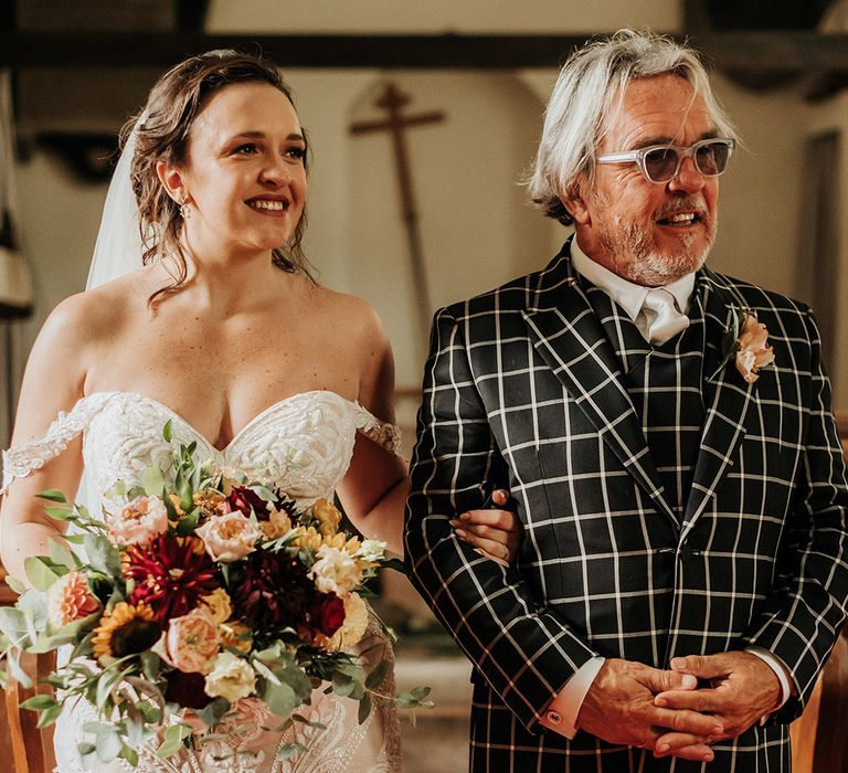 Bride in lace sweetheart Martina Liana wedding dress with father of the bride in checkered suit 