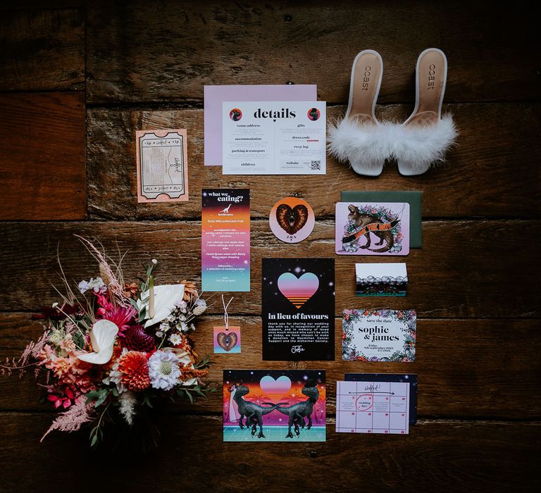 Funky wedding stationery with bright colours and dinosaurs made by the bride 