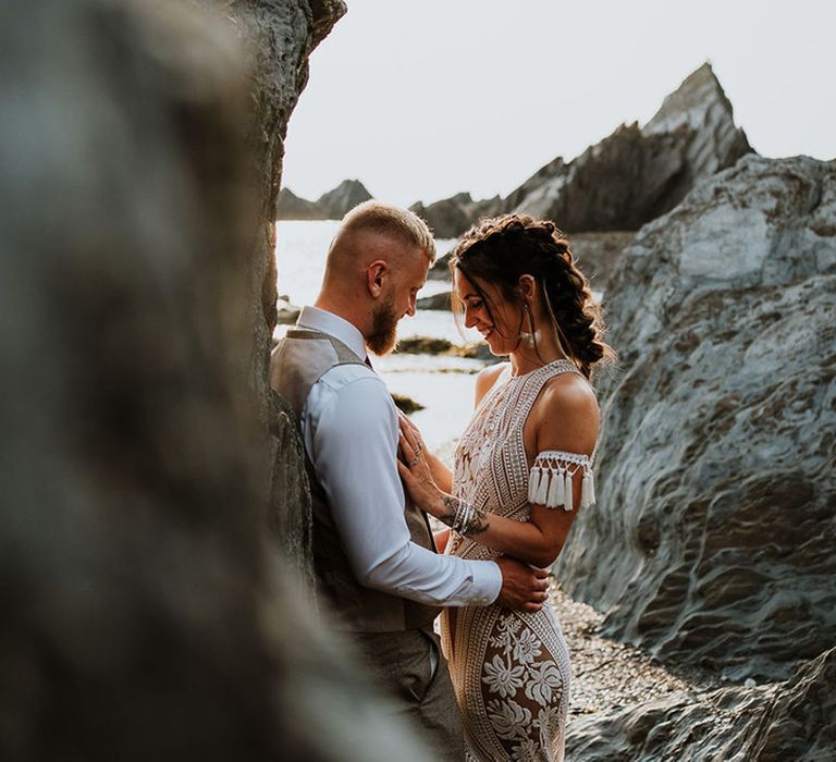 Cute couple portrait with the bride and groom posing for their wedding photos 